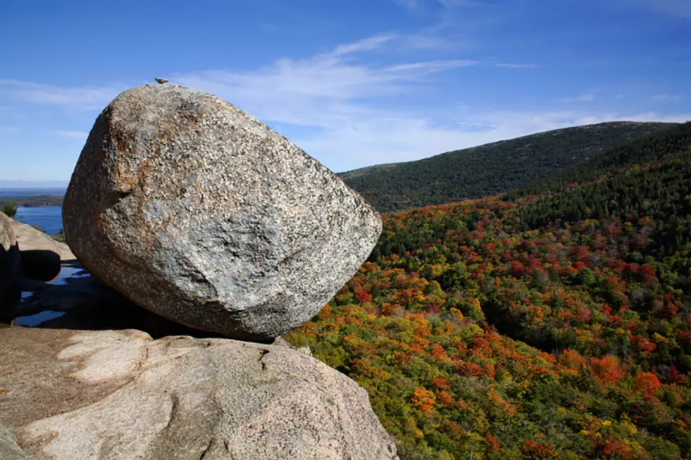 A Glacial Erratic Boulder Called Bubble Rock Is Precariously Perched Upon A Mountain In Acadia National Park Maine United States
