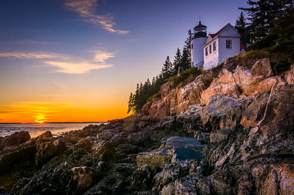 Sunset over Bass Harbor Lighthouse in Acadia National Park Maine