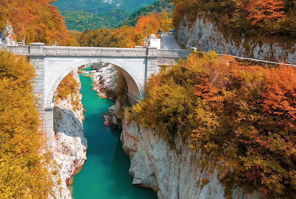 Autumn scenery of Napoleons bridge. The best Photography spots in Slovenia