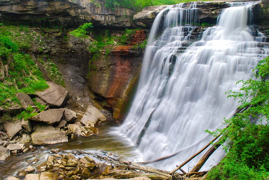 Brandywine Falls in summer green forest. Best places to photograph in Cuyahoga Valley National Park