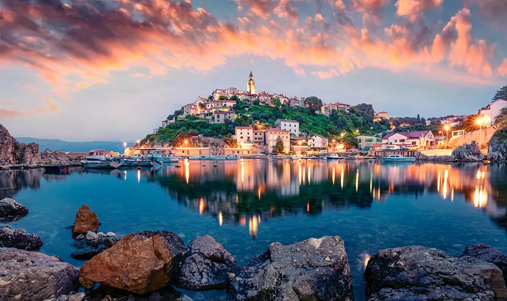 Breathtaking evening cityscape of Vrbnik town. The best Photography spots in Croatia