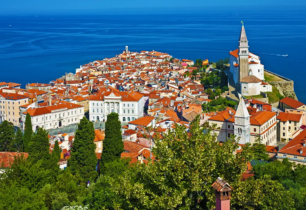 Summertime morning panorama of Piran Slovenia. The best Photography spots in Slovenia