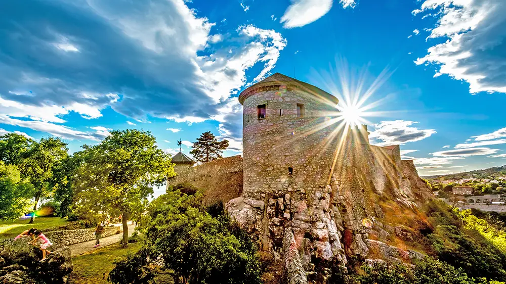 Sunlight over the old castle in Rijeka. The best Photography spots in Croatia