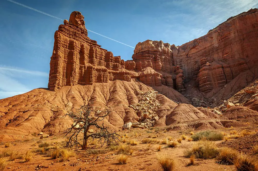 This rock is a natural spire eroded out of the side of the mesa. Best Photography Spots in Capitol Reef National Park