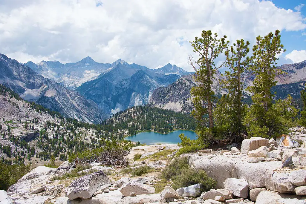 Bullfrog Lake in the foreground and pine forest surrounding the lake. Best Photography Spots in Kings Canyon National Park
