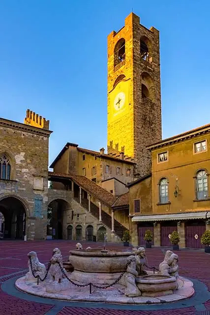 Campanone Civic Tower at main square Piazza Vecchia in Upper Medieval Town in Bergamo. Best Photographys Spots in Bergamo