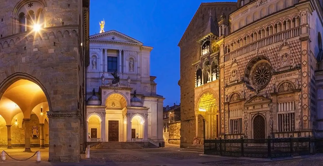 Colleoni chapel Duomo and cathedral Santa Maria Maggiore in upper town at dusk. Best Photography Spots in Bergamo