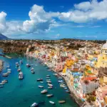 Picturesque fishermen village and port on Procida island in Mediterranean sea. The Best Photography Spots in Naples