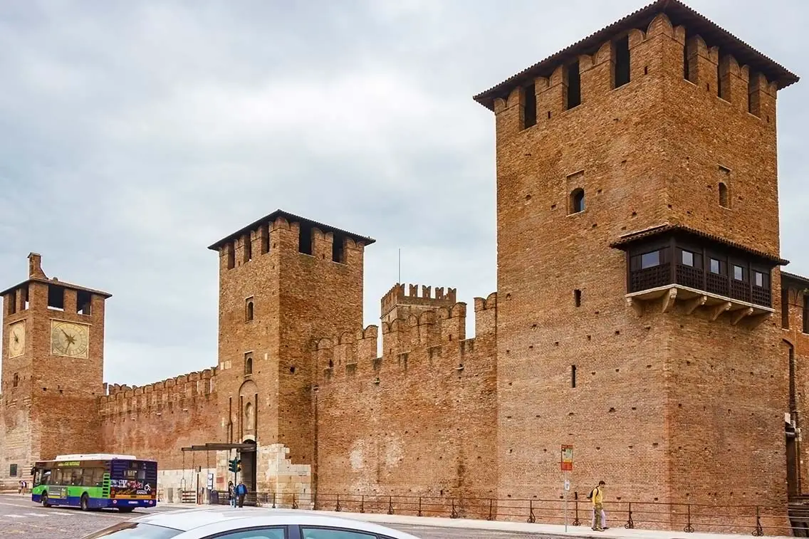 The outer walls with watch towers of the Castelvecchio Castello Scaligero fortress in Verona. Best Photography Spots in Verona