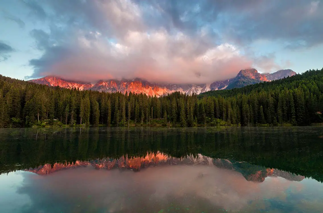 Lago di Carezza at sunset. Best Natural Wonders in Italy