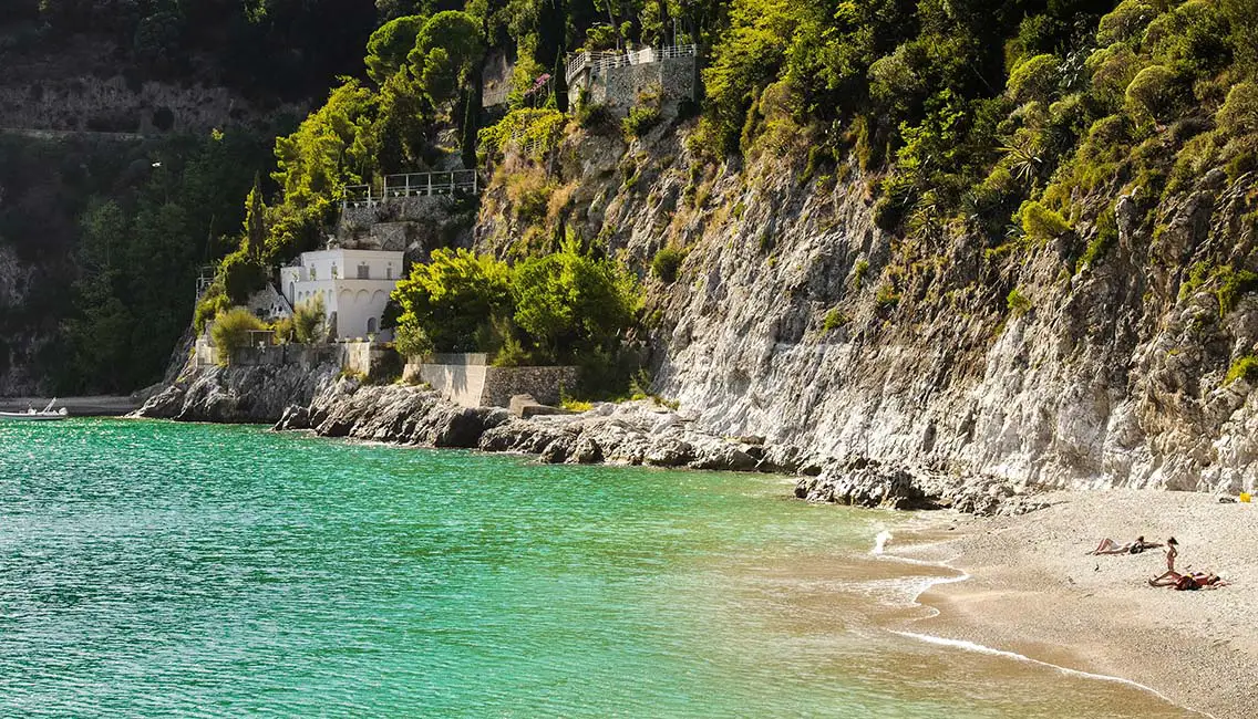 Sunbathing on a beautiful beach in Amalfi Coast. Best Photography Spots in Amalfi Coast