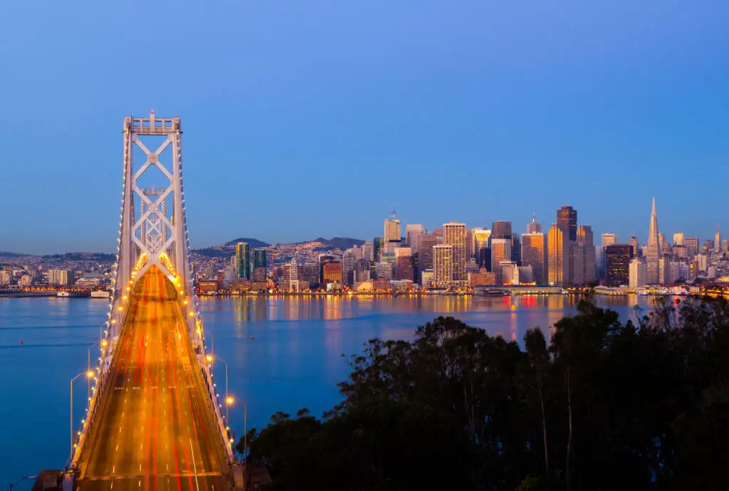 Bay Bridge and San Francisco downtown. Best Cities To Photograph in USA
