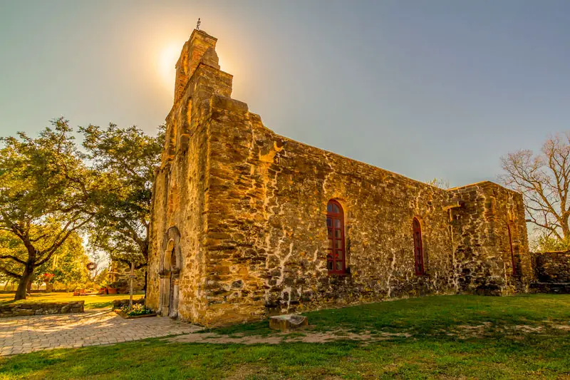 Stunning Halo of Back lit Bell Tower of the Historic Old West Spanish Mission Espada. Best Photography Spots in San Antonio Texas.