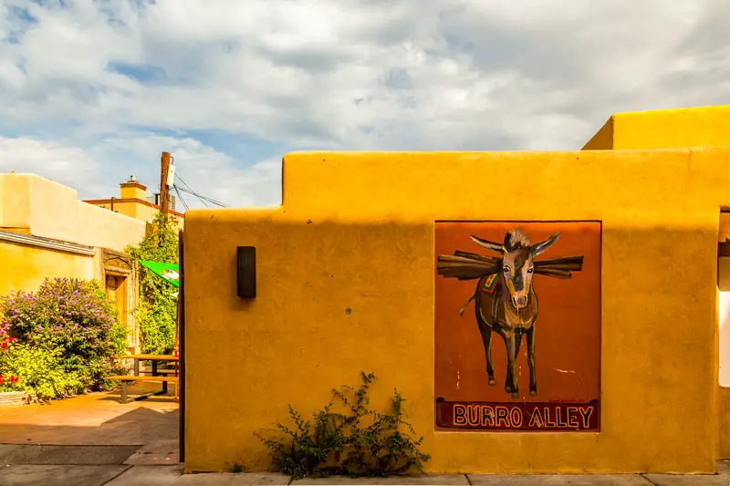 The historic Burro Alley is located in downtown Santa Fe New Mexico. Best Photography Spots in Santa Fe New Mexico.